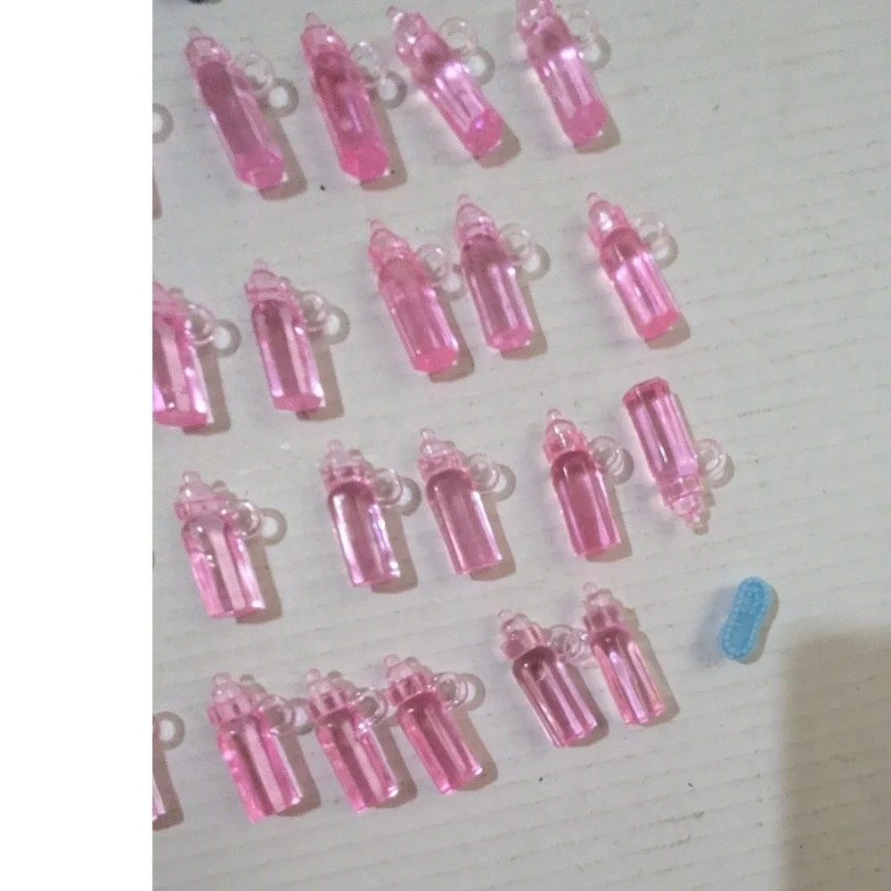 36pc Miniature Baby Shower Favors Pink Plastic Bottles and Blue Booties Set